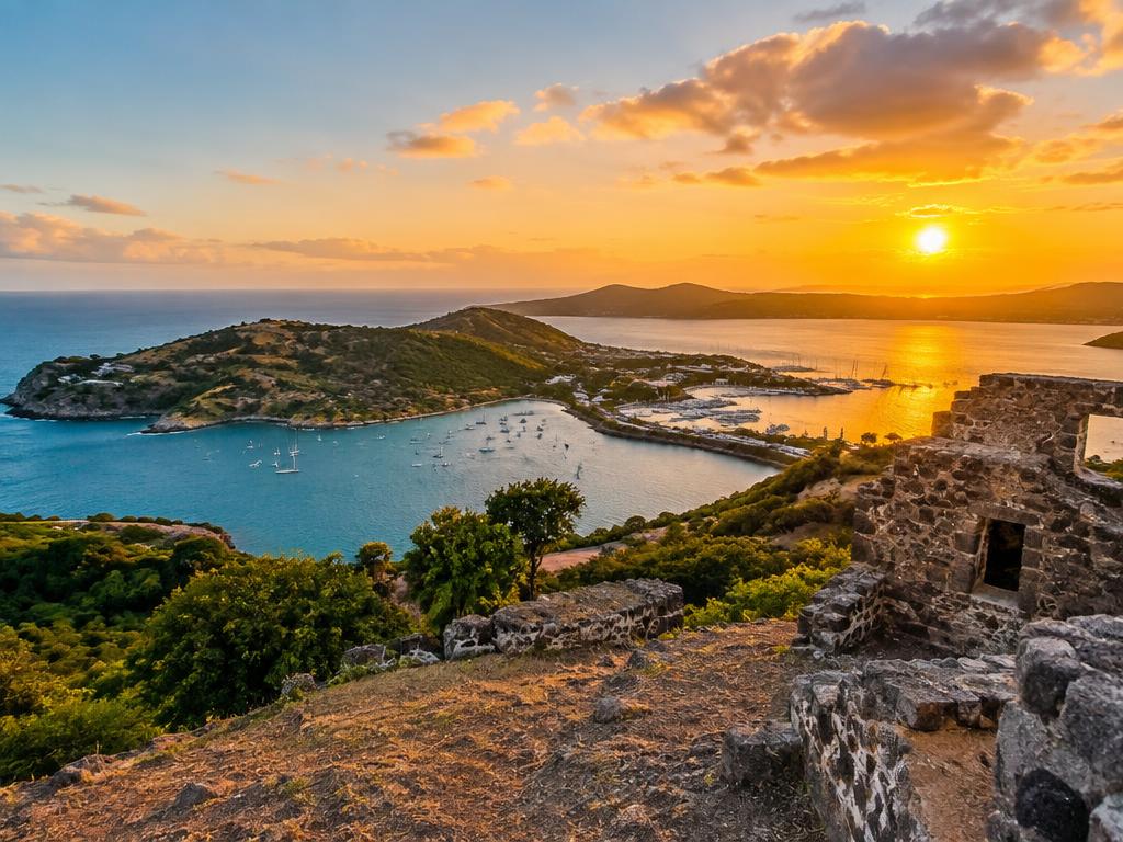 Sunset view over a harbour from a hilltop lookout